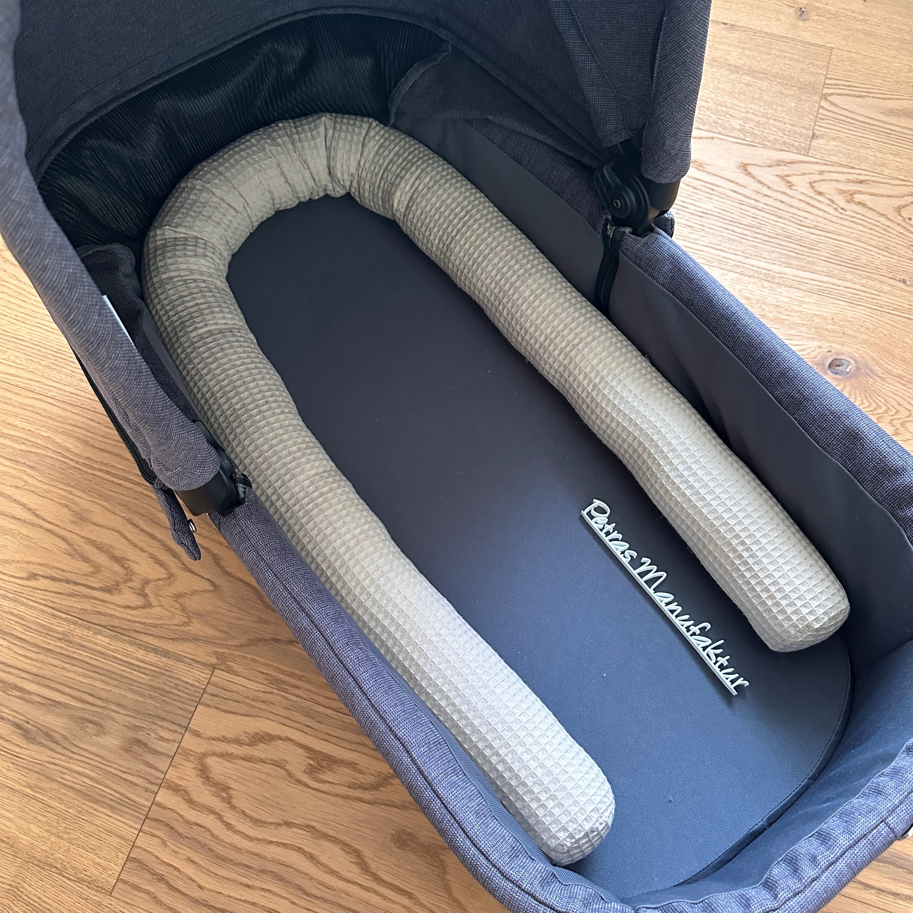 Rolle/Schlange für den Kinderwagen